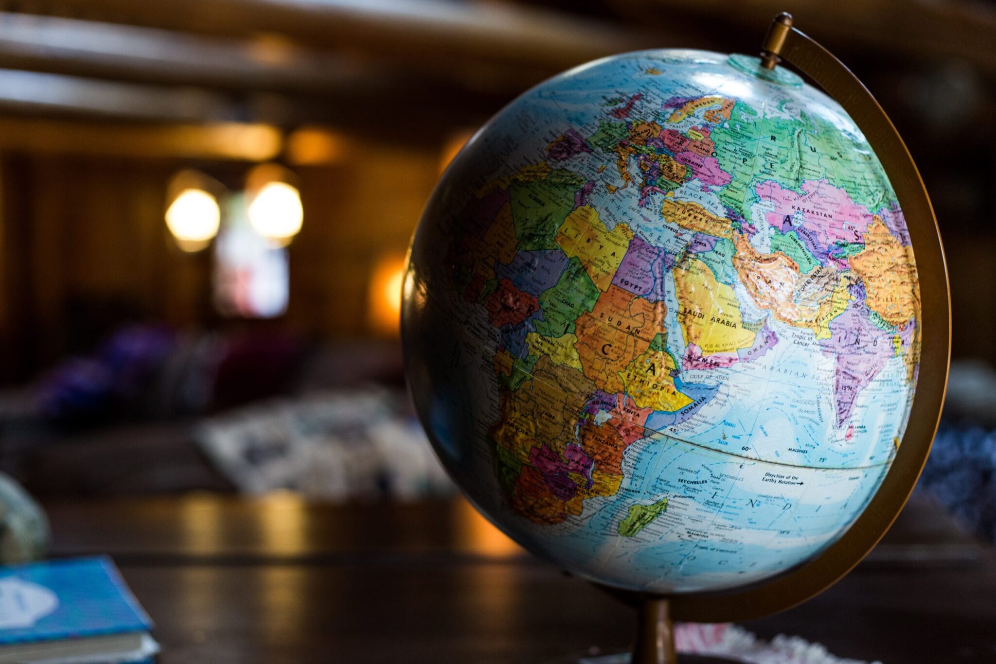 A desktop globe turned to show Africa, the Middle East and the Indian Ocean trade routes