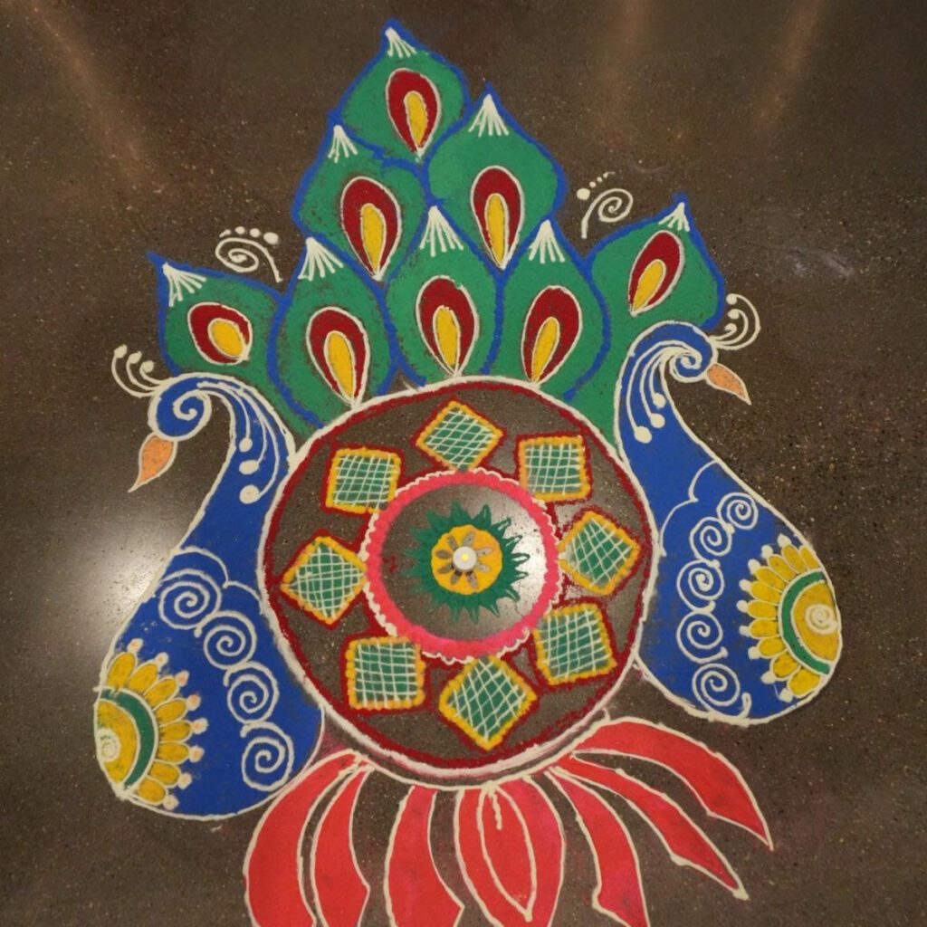A rangoli peacock decoration made for Diwali